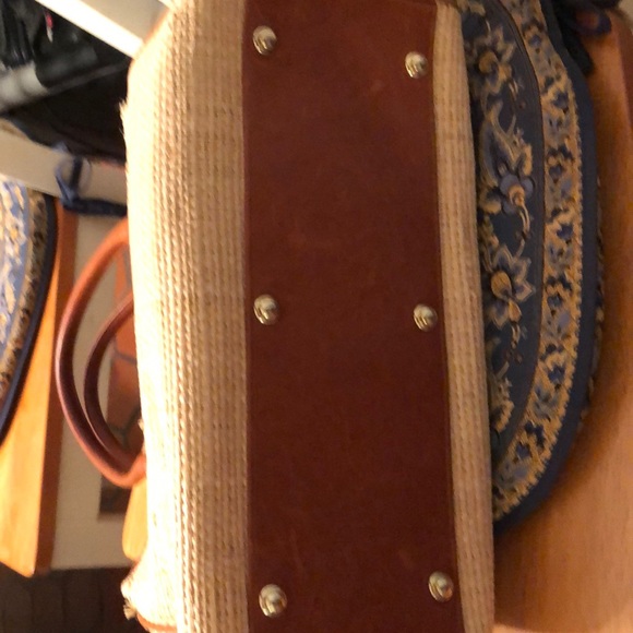 madeline-cane-and-leather-bag-  Brown leather and rattan tote
